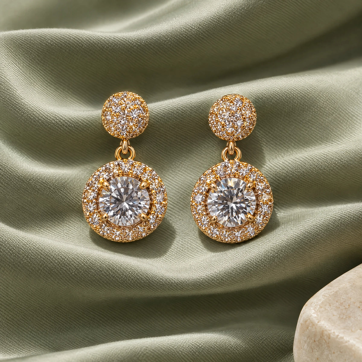 Round Halo Crystal Drop Earrings by Oraki Jewels, styled studio view