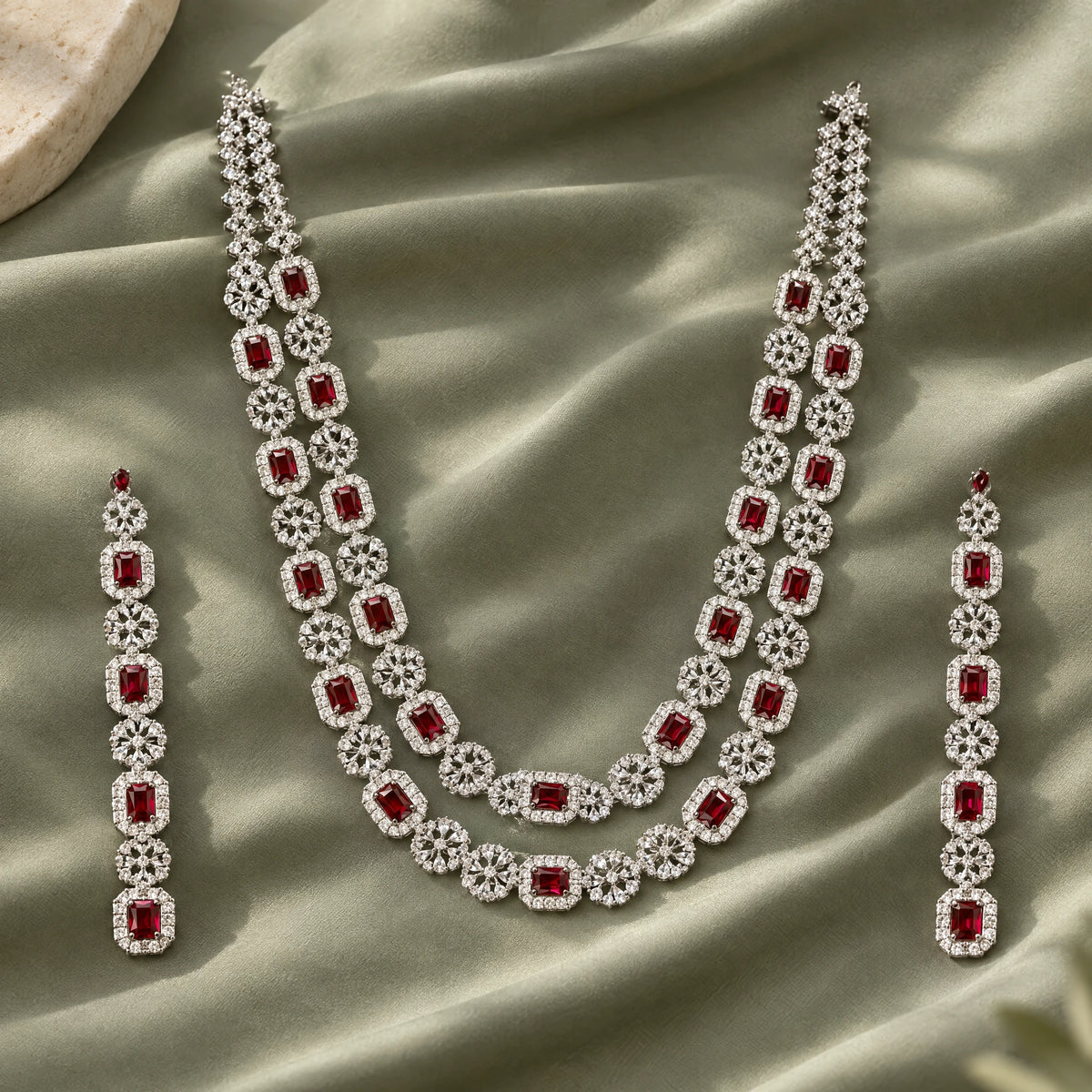 Ruby Red Cushion Crystal Necklace Set by Oraki Jewels, styled studio view