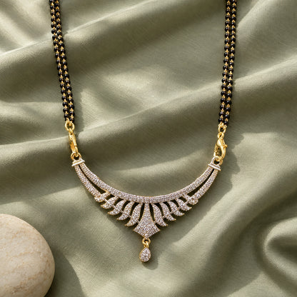 Aavira Grace Crystal Leaf Black Bead Mangalsutra by Oraki Jewels, styled studio view