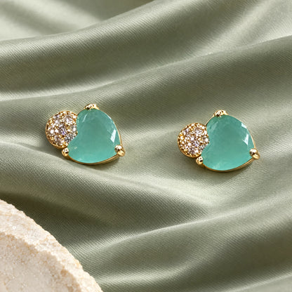 Aqua Heart Crystal Stud Earrings by Oraki Jewels, styled studio view