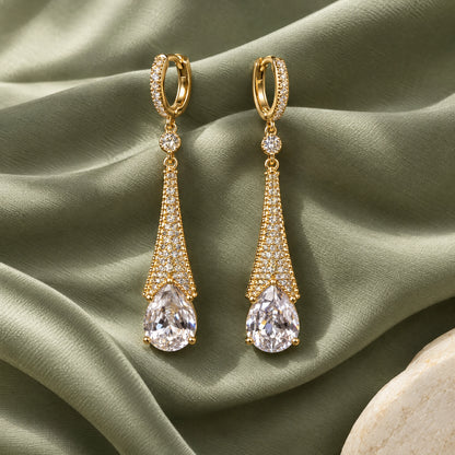 Aurelia Tapered Teardrop Crystal Hoop Earrings by Oraki Jewels, styled studio view