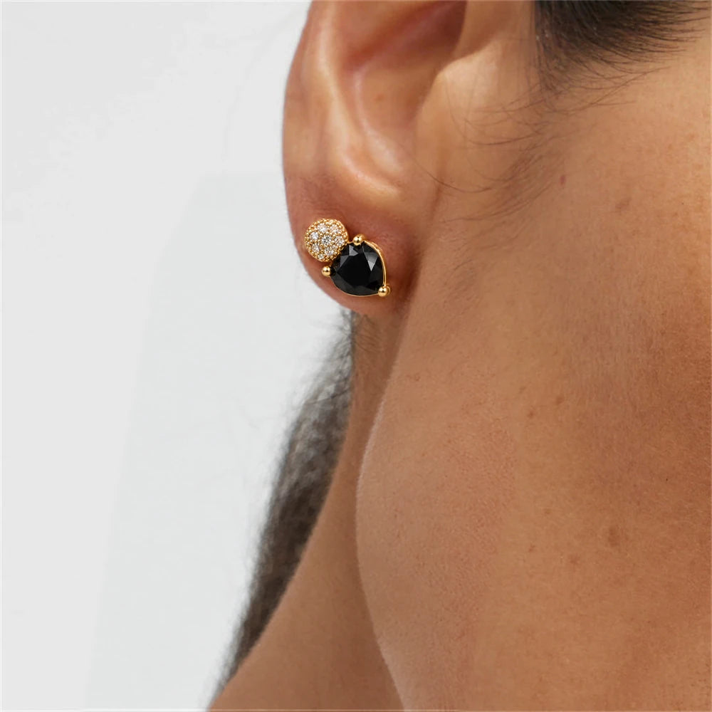 Black Heart Crystal Stud Earrings by Oraki Jewels, shown worn for styling