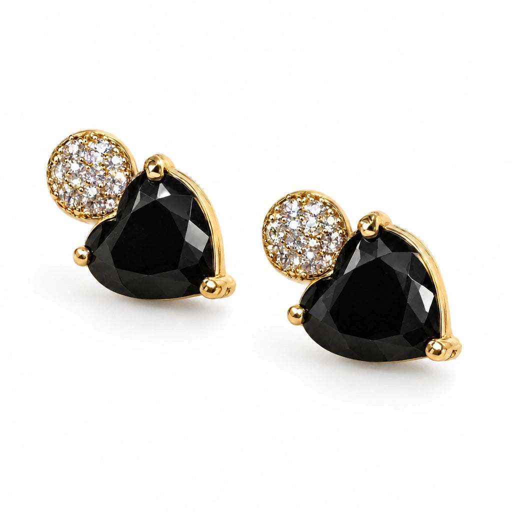 Black Heart Crystal Stud Earrings by Oraki Jewels, angled view on white