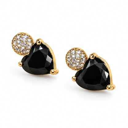 Black Heart Crystal Stud Earrings by Oraki Jewels, angled view on white