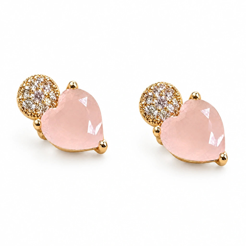 Blush Heart Crystal Stud Earrings by Oraki Jewels, angled view on white