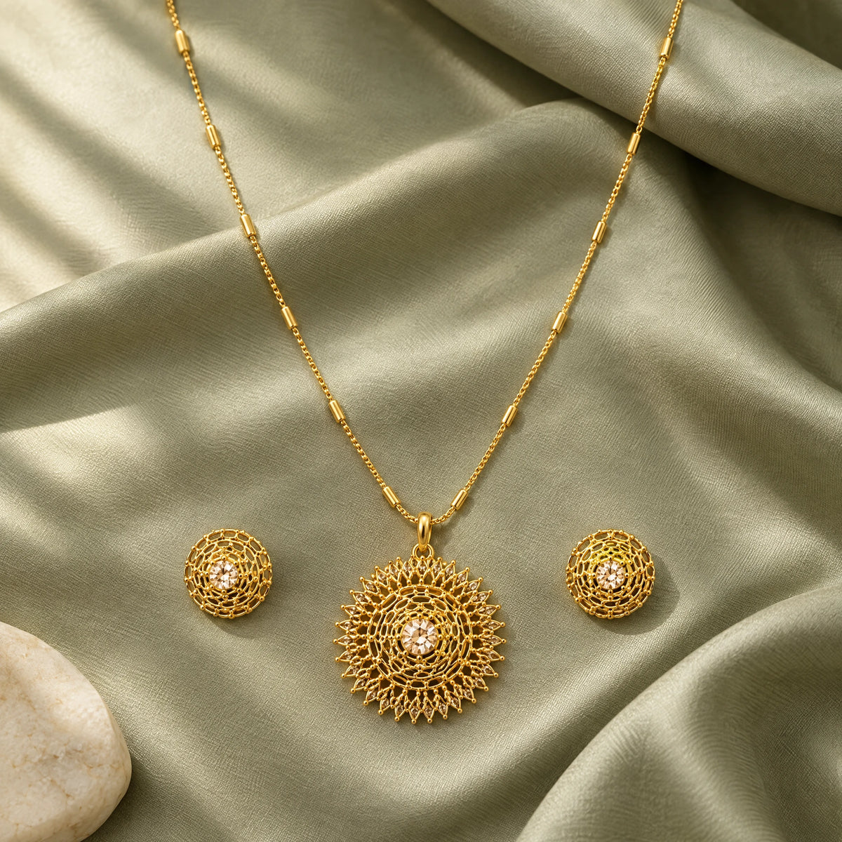 Champagne Filigree Pendant Necklace Set by Oraki Jewels, styled studio view