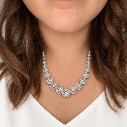 Concentric Circle Crystal Necklace Set by Oraki Jewels, shown worn in a natural studio crop