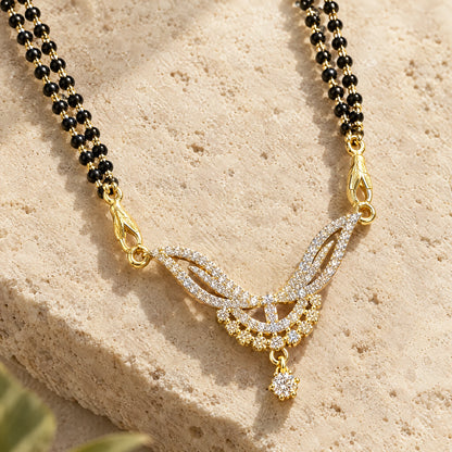 Elara Leaf Black Bead Mangalsutra Set with Earrings by Oraki Jewels, detail close-up