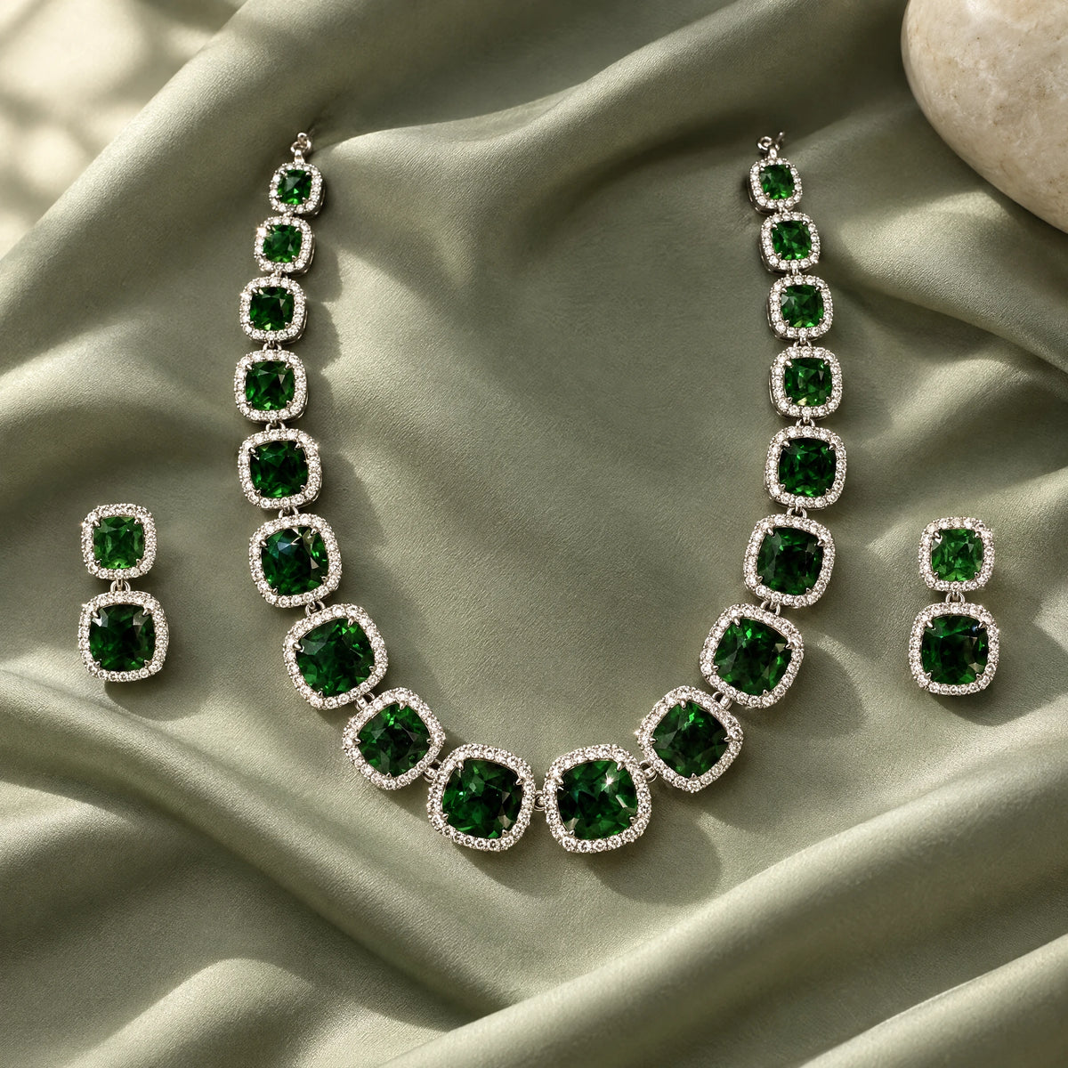 Emerald Green Cushion Tennis Necklace Set by Oraki Jewels, styled studio view
