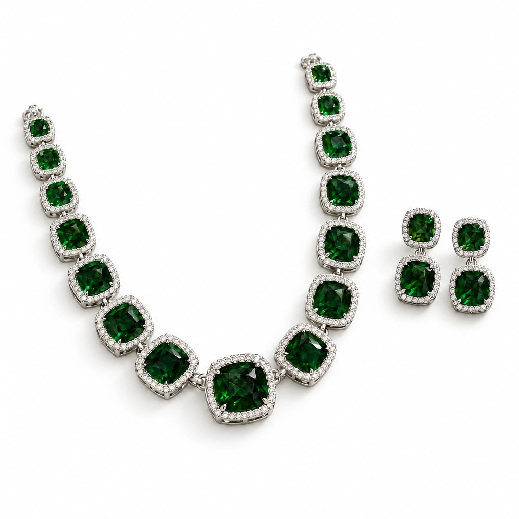 Emerald Green Cushion Tennis Necklace Set by Oraki Jewels, angled view on white