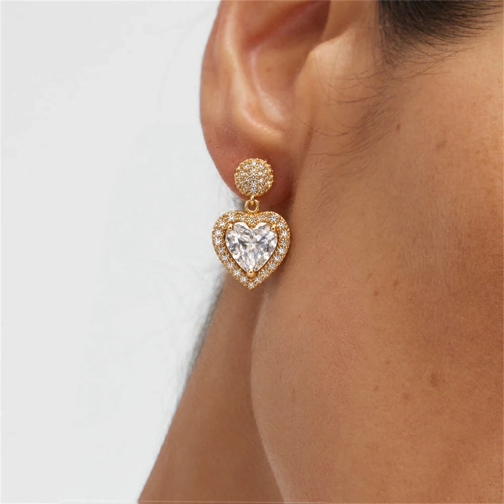 Heart Halo Crystal Drop Earrings by Oraki Jewels, shown worn for styling
