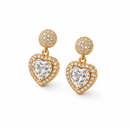Heart Halo Crystal Drop Earrings by Oraki Jewels, angled view on white
