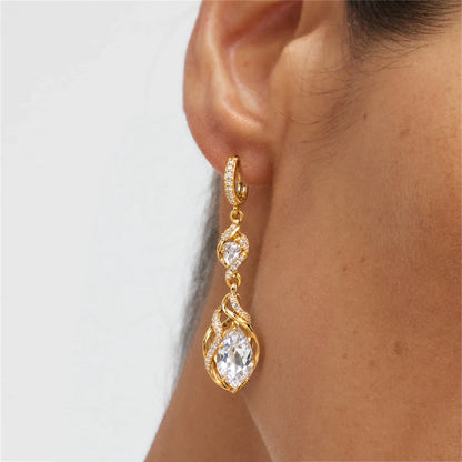 Heartelle Twist Teardrop Crystal Hoop Earrings by Oraki Jewels, shown worn for styling
