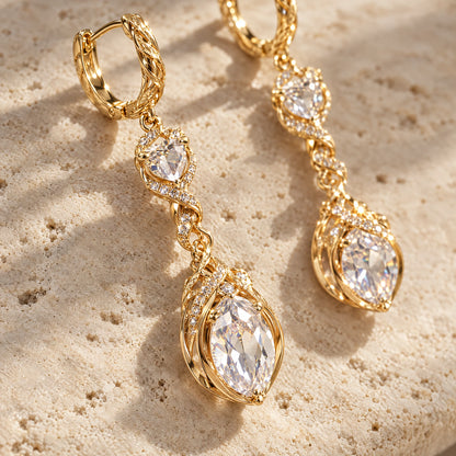 Heartelle Twist Teardrop Crystal Hoop Earrings by Oraki Jewels, detail close-up