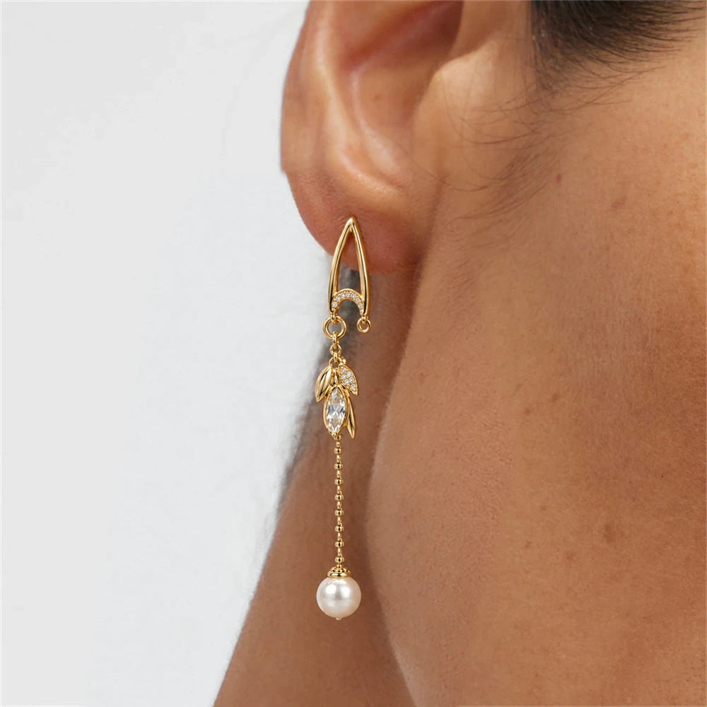 Pearl Leaf Chain Threader Earrings by Oraki Jewels, shown worn for styling