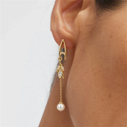 Pearl Leaf Chain Threader Earrings by Oraki Jewels, shown worn for styling