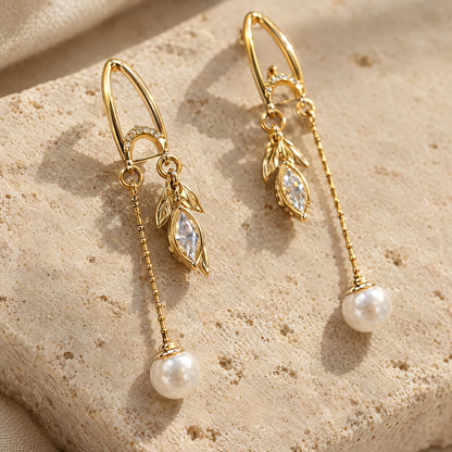 Pearl Leaf Chain Threader Earrings by Oraki Jewels, detail close-up