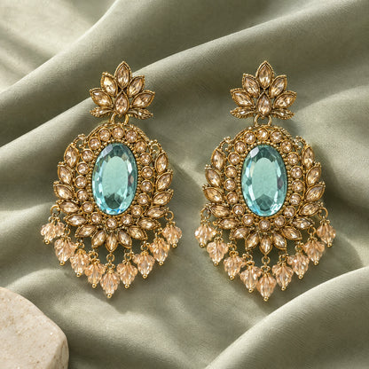 Rajwada Aqua Oval Crystal Chandbali Earrings by Oraki Jewels, styled studio view