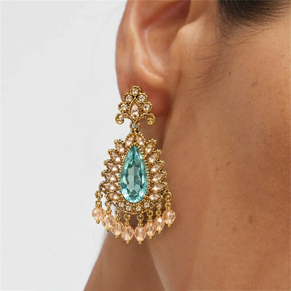 Rajwada Aqua Pear Crystal Chandbali Earrings by Oraki Jewels, shown worn for styling