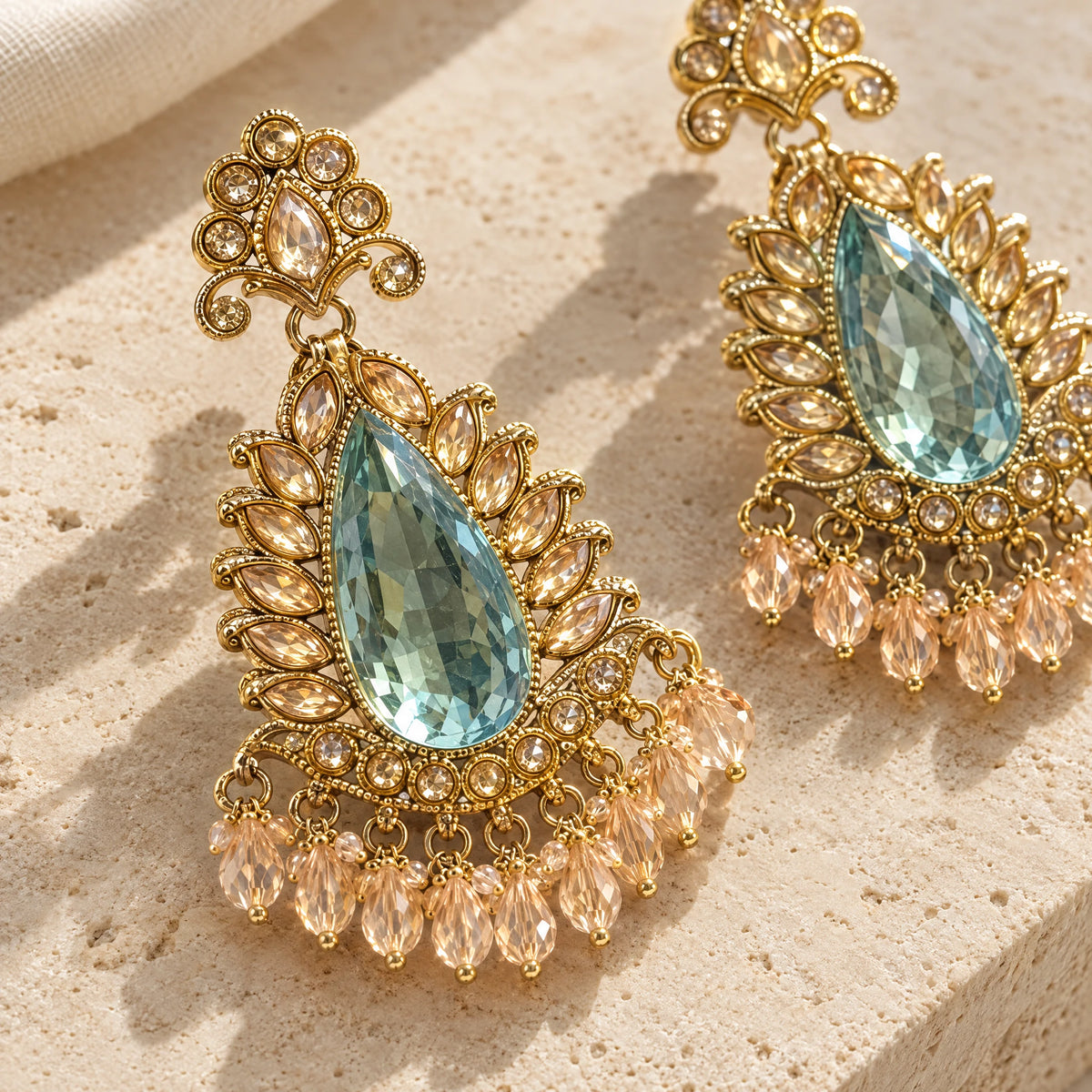 Rajwada Aqua Pear Crystal Chandbali Earrings by Oraki Jewels, detail close-up