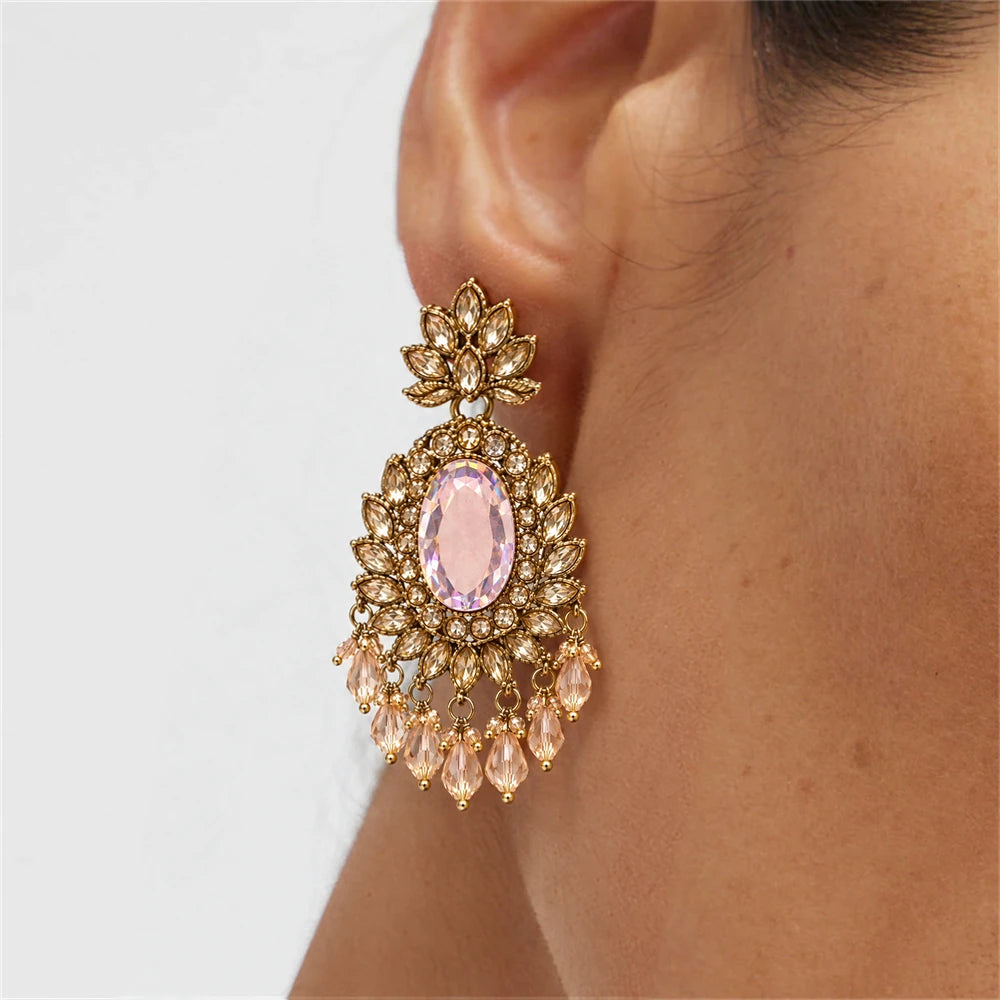 Rajwada Blush Oval Crystal Chandbali Earrings by Oraki Jewels, shown worn for styling