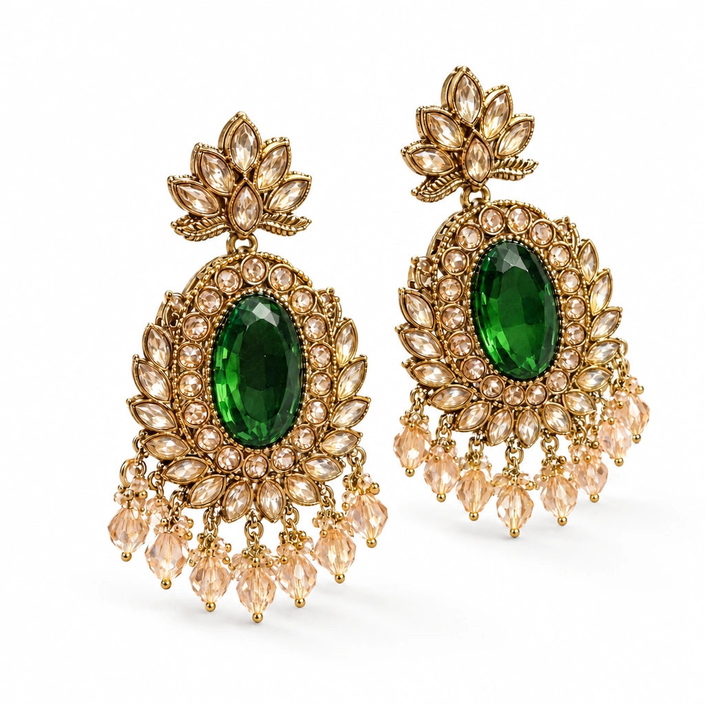Rajwada Emerald Green Oval Crystal Chandbali Earrings by Oraki Jewels, angled view on white