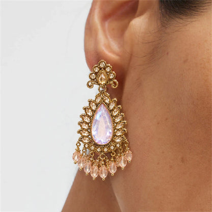 Rajwada Lavender Pear Crystal Chandbali Earrings by Oraki Jewels, shown worn for styling