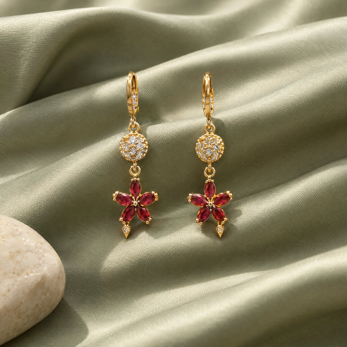 Ruby Floral Crystal Dangle Earrings by Oraki Jewels, styled studio view