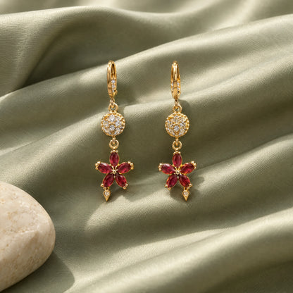 Ruby Floral Crystal Dangle Earrings by Oraki Jewels, styled studio view