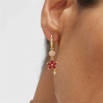 Ruby Floral Crystal Dangle Earrings by Oraki Jewels, shown worn for styling