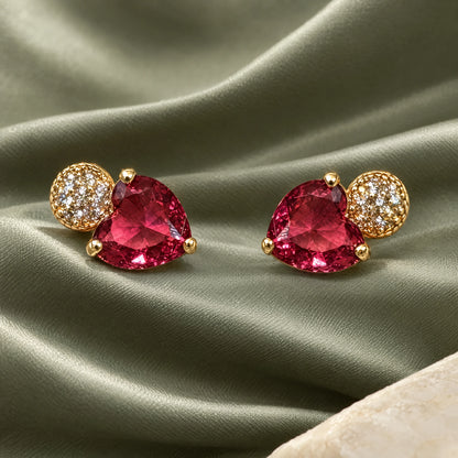 Ruby Pink Heart Crystal Stud Earrings by Oraki Jewels, styled studio view