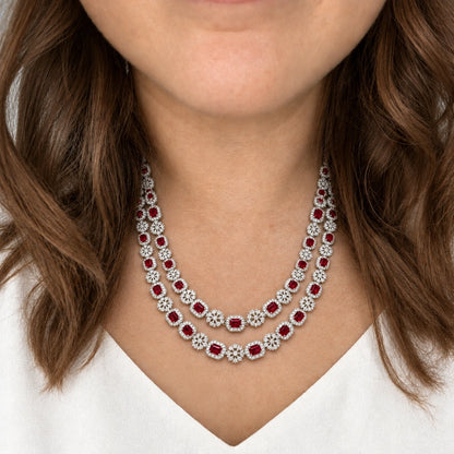Ruby Red Cushion Crystal Necklace Set by Oraki Jewels, shown worn in a natural studio crop