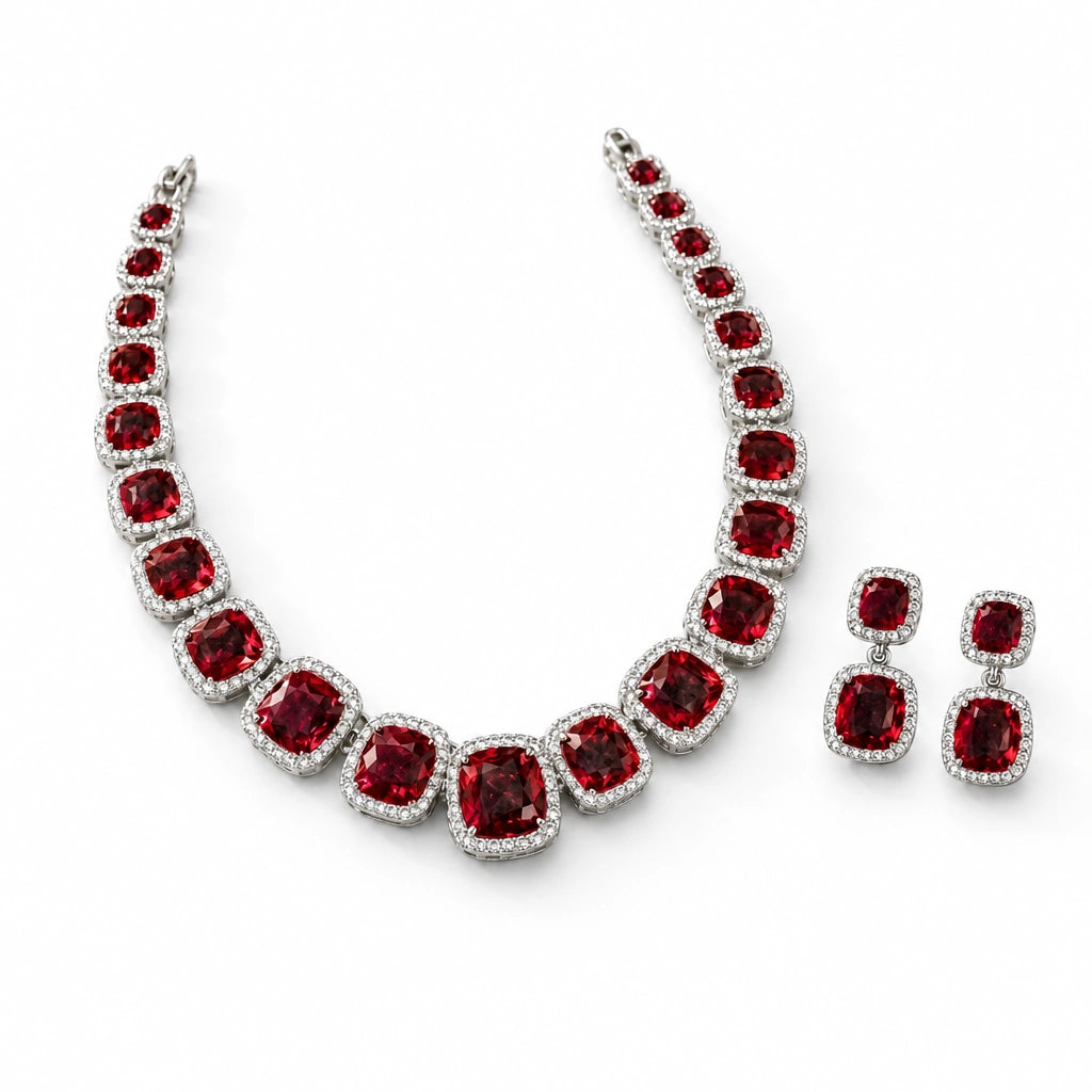 Ruby Red Cushion Tennis Necklace Set by Oraki Jewels, angled view on white