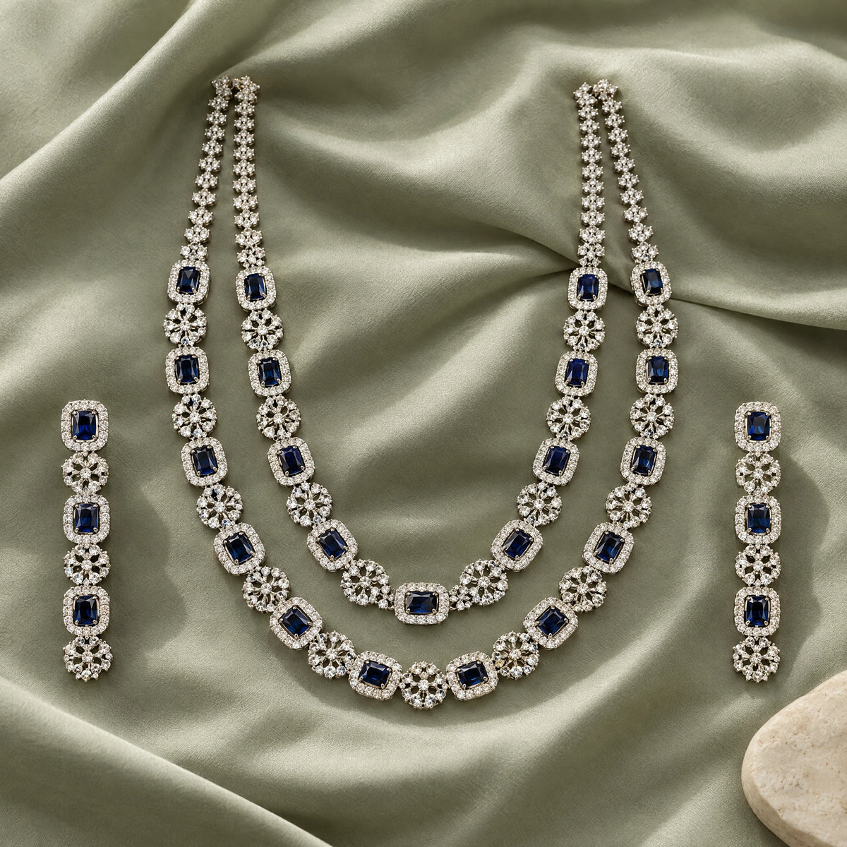 Sapphire Blue Cushion Crystal Necklace Set by Oraki Jewels, styled studio view